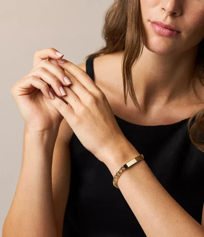 Bracciale Ellis in acciaio inossidabile color oro con targhetta identificativa