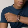 Bracciale Machine in acciaio inossidabile resistente e cinturino in pelle imbottita marrone