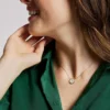Merrit Classic Collana con pendente in acciaio inossidabile color oro e madreperla