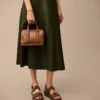 Mini borsa a tracolla in pelle Carlie