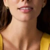 Orecchini a cerchio Ellis in ottone dorato con forme miste