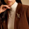 Spilla a forma di serpente in acciaio inossidabile color oro